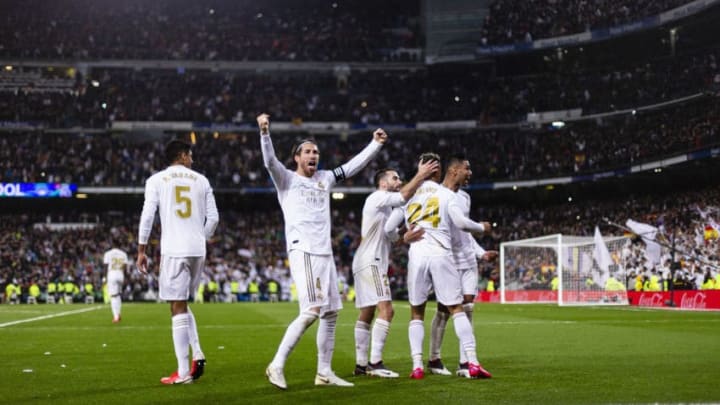 Real Madrid players celebrate against Barcelona. (Photo by Ricardo Nogueira/Eurasia Sport Images/Getty Images)