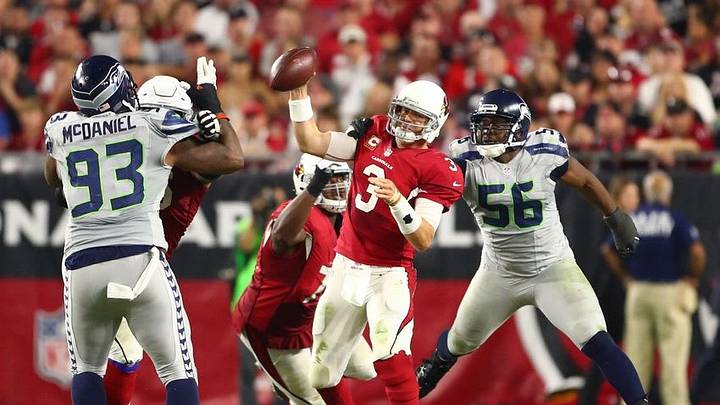 Oct 23, 2016; Glendale, AZ, USA; Arizona Cardinals quarterback Carson Palmer (3) is sacked by Seattle Seahawks defensive end Cliff Avril (56) in the second half at University of Phoenix Stadium. The game ended in a 6-6 tie after overtime. Mandatory Credit: Mark J. Rebilas-USA TODAY Sports Oct 23, 2016; Glendale, AZ, USA; Arizona Cardinals quarterback Carson Palmer (3) is sacked by Seattle Seahawks defensive end Cliff Avril (56) in the second half at University of Phoenix Stadium. The game ended in a 6-6 tie after overtime. Mandatory Credit: Mark J. Rebilas-USA TODAY Sports
