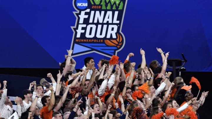 MINNEAPOLIS, MINNESOTA - APRIL 08: Virginia Cavaliers fans cheer on their team against the Texas Tech Red Raiders in the second half during the 2019 NCAA men's Final Four National Championship game at U.S. Bank Stadium on April 08, 2019 in Minneapolis, Minnesota. (Photo by Hannah Foslien/Getty Images)
