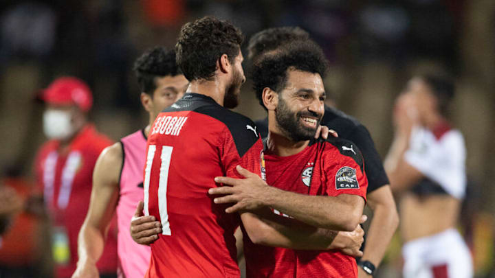 YAOUNDE, CAMEROON - JANUARY 30: MOHAMED SALAH and RAMADAN SOBHI of Egypt celebrate winning the Africa Cup of Nations (CAN) 2021 quarter-final football match between Egypt and Morocco at Stade Ahmadou Ahidjo in Yaounde on January 30, 2022. (Photo by Visionhaus/Getty Images)