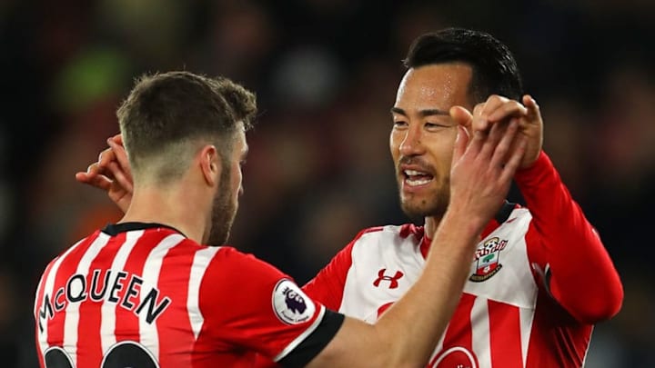 SOUTHAMPTON, ENGLAND - APRIL 05: Maya Yoshida of Southampton (R) celebrates scoring his sides second goal with Sam McQueen of Southampton (L) during the Premier League match between Southampton and Crystal Palace at St Mary's Stadium on April 5, 2017 in Southampton, England. (Photo by Warren Little/Getty Images)