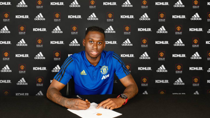 MANCHESTER, ENGLAND - JUNE 29: Aaron Wan-Bissaka of Manchester United poses after signing for the club at Aon Training Complex on June 29, 2019 in Manchester, England. (Photo by Manchester United/Manchester United via Getty Images)