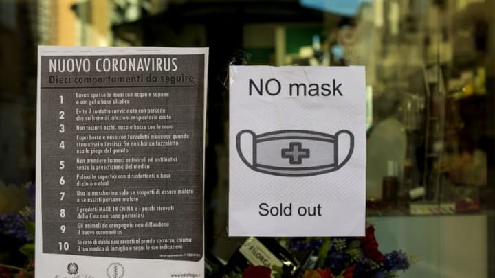 ROME, ITALY - MARCH 11: A pharmacy in the center of Rome displays a sign informing the protective masks are sold out on March 11, 2020 in Rome, Italy. The Italian Government has taken the unprecedented measure of a nationwide lockdown in an effort to fight the world's second-most deadly coronavirus (Covid-19) outbreak outside of China. The movements in and out are allowed only for work and health reasons proven by a medical certificate. The justifications for the movements needs to be certified with a self-declaration by filling in forms provided by the police forces in charge of the check. (Photo by Stefano Montesi - Corbis/ Getty Images)