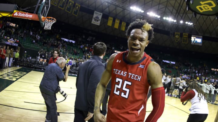 WACO, TX - JANUARY 11: Adonis Arms #25 of the Texas Tech Red Raiders celebrates following Techs 65-62 win over the Baylor Bears at the Ferrell Center on January 11, 2022 in Waco, Texas. (Photo by Ron Jenkins/Getty Images)