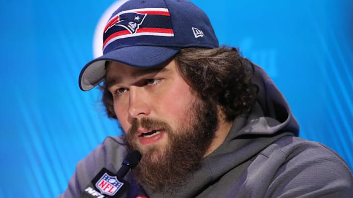 ATLANTA, GEORGIA - JANUARY 28: Center David Andrews #60 of the New England Patriots talks to the media during Super Bowl LIII Opening Night at State Farm Arena on January 28, 2019 in Atlanta, Georgia. (Photo by Rob Carr/Getty Images)