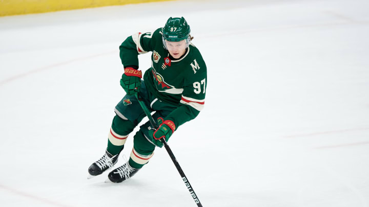 ST PAUL, MINNESOTA – APRIL 17: Kirill Kaprizov #97 of the Minnesota Wild controls the puck against the San Jose Sharks during the game at Xcel Energy Center on April 17, 2021, in St Paul, Minnesota. The Wild defeated the Sharks 5-2. (Photo by Hannah Foslien/Getty Images)