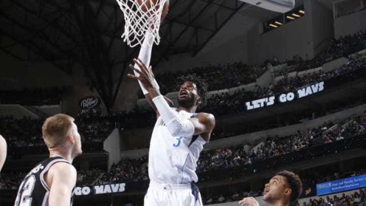 DALLAS, TX – APRIL 7: Nerlens Noel #3 of the Dallas Mavericks dunks against the San Antonio Spurs during the game on April 7, 2017 at the American Airlines Center in Dallas, Texas. NOTE TO USER: User expressly acknowledges and agrees that, by downloading and or using this photograph, User is consenting to the terms and conditions of the Getty Images License Agreement. Mandatory Copyright Notice: Copyright 2017 NBAE (Photo by Glenn James/NBAE via Getty Images)