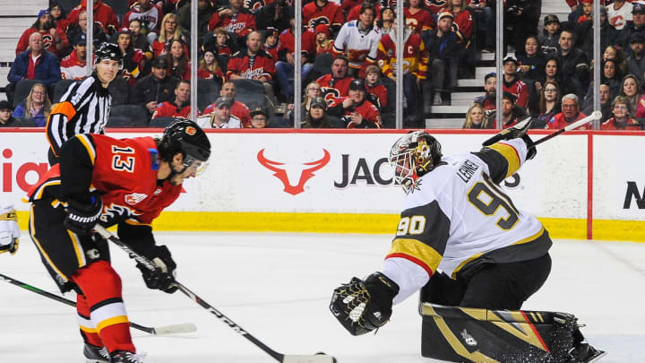 CALGARY, AB – MARCH 8: Johnny Gaudreau #13 of the Calgary Flames misses a shot on a breakaway on the net of Robin Lehner #90 of the Vegas Golden Knights during an NHL game at Scotiabank Saddledome on March 8, 2020 in Calgary, Alberta, Canada. (Photo by Derek Leung/Getty Images)