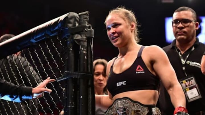 Aug 1, 2015; Rio de Janeiro, RJ, Brazil; Ronda Rousey (red gloves) celebrates after defeating Bethe Correia (not pictured) during UFC 190 at HSBC Arena. Mandatory Credit: Jason Silva-USA TODAY Sports