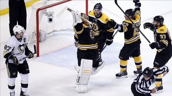 Jun 5, 2013; Boston, MA, USA; Boston Bruins goalie Tuukka Rask (40) celebrates defeating the Pittsburgh Penguins 1-0 in game four of the Eastern Conference finals of the 2013 Stanley Cup Playoffs at TD Garden. Mandatory Credit: Greg M. Cooper-USA TODAY Sports