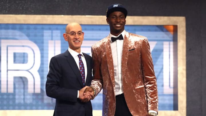 NEW YORK, NY - JUNE 21: Jaren Jackson Jr. poses with NBA Commissioner Adam Silver after being drafted fourth overall by the Memphis Grizzlies during the 2018 NBA Draft at the Barclays Center on June 21, 2018 in the Brooklyn borough of New York City. NOTE TO USER: User expressly acknowledges and agrees that, by downloading and or using this photograph, User is consenting to the terms and conditions of the Getty Images License Agreement. (Photo by Mike Stobe/Getty Images) NEW YORK, NY - JUNE 21: Jaren Jackson Jr. poses with NBA Commissioner Adam Silver after being drafted fourth overall by the Memphis Grizzlies during the 2018 NBA Draft at the Barclays Center on June 21, 2018 in the Brooklyn borough of New York City. NOTE TO USER: User expressly acknowledges and agrees that, by downloading and or using this photograph, User is consenting to the terms and conditions of the Getty Images License Agreement. (Photo by Mike Stobe/Getty Images)