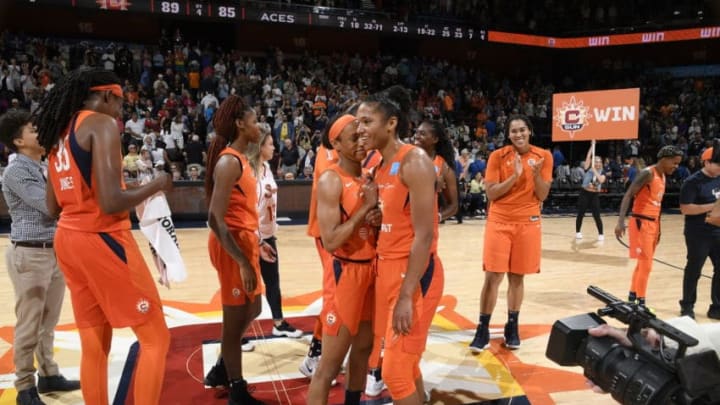 UNCASVILLE, CT - AUGUST 23: Jasmine Thomas #5 of the Connecticut Sun and Alyssa Thomas #25 of the Connecticut Sun embrace following he game against the Las Vegas Aces on August 23, 2019 at the Mohegan Sun Arena in Uncasville, Connecticut. NOTE TO USER: User expressly acknowledges and agrees that, by downloading and or using this photograph, User is consenting to the terms and conditions of the Getty Images License Agreement. Mandatory Copyright Notice: Copyright 2019 NBAE (Photo by Brian Babineau/NBAE via Getty Images)