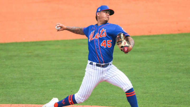 Mar 2, 2021; Port St. Lucie, Florida, USA; New York Mets starting pitcher Jordan Yamamoto (45) delivers a pitch against the Houston Astros during the third inning at Clover Park. Mandatory Credit: Sam Navarro-USA TODAY Sports
