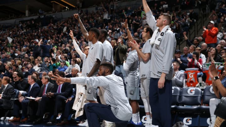MINNEAPOLIS, MN - APRIL 11: The Minnesota Timberwolves bench celebrate during the game against the Denver Nuggets on April 11, 2018 at Target Center in Minneapolis, Minnesota. NOTE TO USER: User expressly acknowledges and agrees that, by downloading and or using this Photograph, user is consenting to the terms and conditions of the Getty Images License Agreement. Mandatory Copyright Notice: Copyright 2018 NBAE (Photo by David Sherman/NBAE via Getty Images)