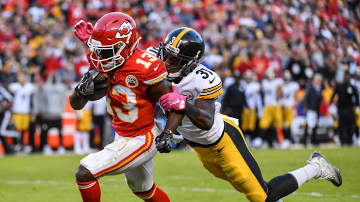 KANSAS CITY, MO - OCTOBER 15: Wide receiver De'Anthony Thomas #13 of the Kansas City Chiefs breaks through the tackle attempt of defensive back Mike Hilton #31 of the Pittsburgh Steelers on his way to a touchdown during the fourth quarter at Arrowhead Stadium on October 15, 2017 in Kansas City, Missouri. ( Photo by Peter Aiken/Getty Images ) KANSAS CITY, MO - OCTOBER 15: Wide receiver De'Anthony Thomas #13 of the Kansas City Chiefs breaks through the tackle attempt of defensive back Mike Hilton #31 of the Pittsburgh Steelers on his way to a touchdown during the fourth quarter at Arrowhead Stadium on October 15, 2017 in Kansas City, Missouri. ( Photo by Peter Aiken/Getty Images )