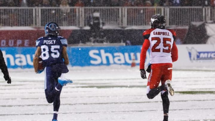 DeVier Posey #85 of the Toronto Argonauts outruns Tommie Campbell #25 of the Calgary Stampeders, scoring a touchdown after his catch during the first half of the 105th Grey Cup Championship Game at TD Place Stadium. (Photo by Andre Ringuette/Getty Images)