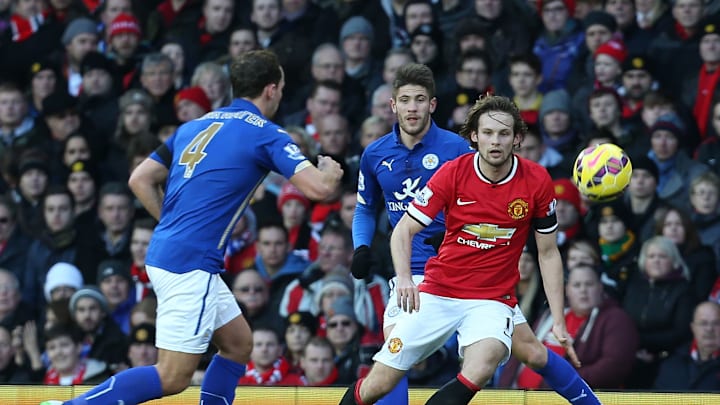 MANCHESTER, ENGLAND – JANUARY 31: Daley Blind of Manchester United in action with Danny Drinkwater of Leicester City during the Barclays Premier League match between Manchester United and Leicester City at Old Trafford on January 31, 2015 in Manchester, England. (Photo by Matthew Peters/Man Utd via Getty Images)