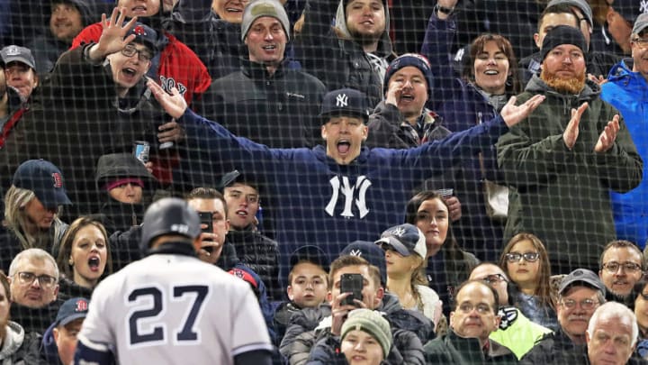 BOSTON - APRIL 10: A New York Yankees fan reacts after Giancarlo Stanton strikes out for the second time in the game. The Boston Red Sox host the New York Yankees in a regular season MLB baseball game at Fenway Park in Boston on April 10, 2018. (Photo by Jim Davis/The Boston Globe via Getty Images)
