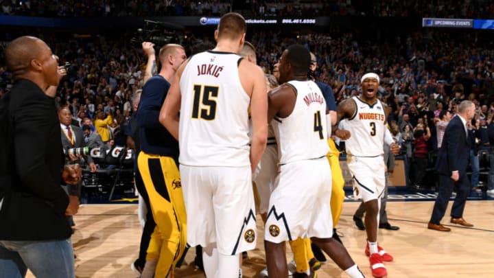 DENVER, CO - OCTOBER 21: The Denver Nuggets celebrate after the game against the Golden State Warriors on October 21, 2018 at the Pepsi Center in Denver, Colorado. NOTE TO USER: User expressly acknowledges and agrees that, by downloading and/or using this photograph, user is consenting to the terms and conditions of the Getty Images License Agreement. Mandatory Copyright Notice: Copyright 2018 NBAE (Photo by Garrett Ellwood/NBAE via Getty Images)