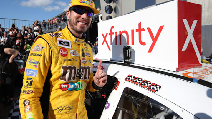 INDIANAPOLIS, INDIANA - SEPTEMBER 07: Kyle Busch, driver of the #18 Combos Toyota, celebrates after winning the NASCAR Xfinity Series Indiana 250 at Indianapolis Motor Speedway on September 07, 2019 in Indianapolis, Indiana. (Photo by Chris Graythen/Getty Images)