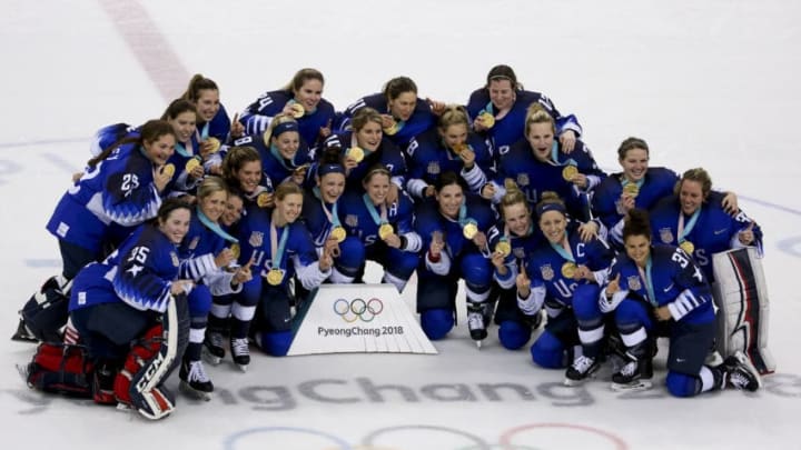 GANGNEUNG, SOUTH KOREA - FEBRUARY 22: Players of Team USA celebrate winning the gold medal after penalty-shot shootout following the Women's Ice Hockey Gold Medal game final between USA and Canada on day thirteen of the PyeongChang 2018 Winter Olympic Games at Gangneung Hockey Centre on February 22, 2018 in Gangneung, South Korea. (Photo by Jean Catuffe/Getty Images)