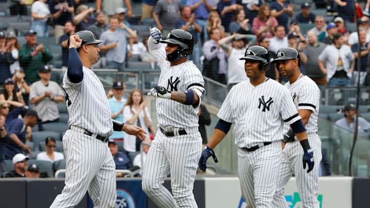 Daily Fantasy Baseball Picks: NEW YORK, NEW YORK - JUNE 19: Gleyber Torres #25 of the New York Yankees celebrates his seventh inning grand slam home run against the Tampa Bay Rays with teammates Gary Sanchez #24 (L), Edwin Encarnacion #30 (2nd R) and Aaron Hicks #31 (R) at Yankee Stadium on June 19, 2019 in New York City. (Photo by Jim McIsaac/Getty Images)