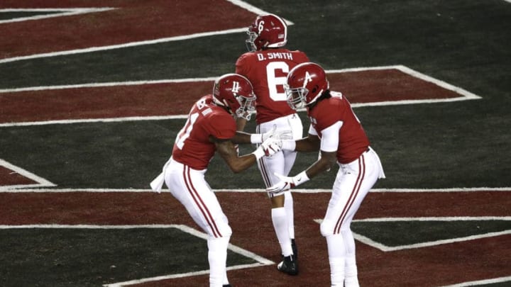 SANTA CLARA, CALIFORNIA - JANUARY 07: Jerry Jeudy #4 of the Alabama Crimson Tide celebrates his 62 yard touchdown reception thrown by Tua Tagovailoa #13 against the Clemson Tigers during the first quarter in the College Football Playoff National Championship at Levi's Stadium on January 07, 2019 in Santa Clara, California. (Photo by Lachlan Cunningham/Getty Images)