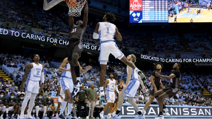 CHAPEL HILL, NORTH CAROLINA - NOVEMBER 12: Nana Owusu-Anane #31 of the Brown Bears dunks against the North Carolina Tar Heels during the first half of their game at the Dean E. Smith Center on November 12, 2021 in Chapel Hill, North Carolina. (Photo by Grant Halverson/Getty Images)