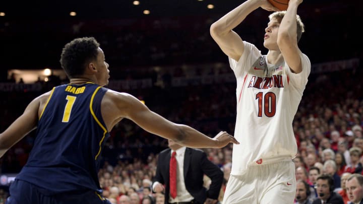 Feb 11, 2017; Tucson, AZ, USA; Arizona Wildcats forward Lauri Markkanen (10) shoots over California Golden Bears forward Ivan Rabb (1) during the second half at McKale Center. Arizona won 62-57. Mandatory Credit: Casey Sapio-USA TODAY Sports