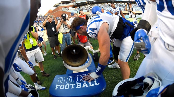 CHAPEL HILL, NC – SEPTEMBER 23: Ben Humphreys #34 of the Duke Blue Devils rings the Victory Bell after a win against the North Carolina Tar Heels at Kenan Stadium on September 23, 2017 in Chapel Hill, North Carolina. Duke won 27-17. (Photo by Grant Halverson/Getty Images)