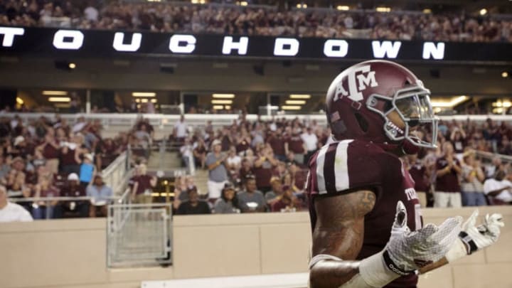COLLEGE STATION, TX - AUGUST 30: Trayveon Williams #5 of the Texas A&M Aggies celebrates after scoring a touchdown on a 40 yard run against the Northwestern State Demons during the second half of a football game at Kyle Field on August 30, 2018 in College Station, Texas. (Photo by Cooper Neill/Getty Images)