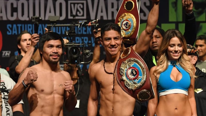 LAS VEGAS, NV - NOVEMBER 04: Manny Pacquiao (L) and WBO welterweight champion Jessie Vargas pose during their official weigh-in at the Encore Theater at Wynn Las Vegas on November 4, 2016 in Las Vegas, Nevada. Vargas will defend his title against Pacquiao on November 5 at the Thomas
