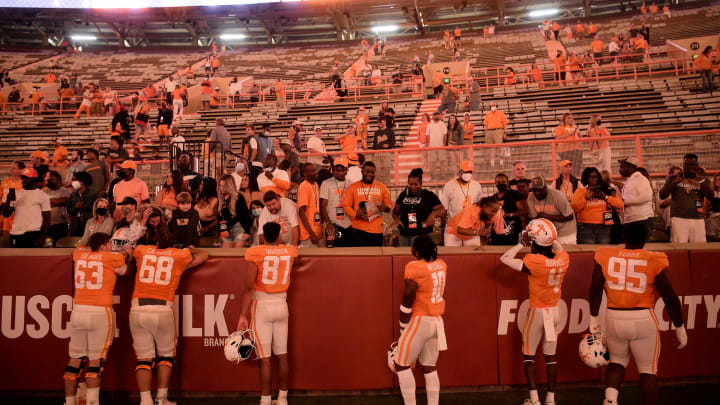 Players greet loved ones following a game at Neyland Stadium in Knoxville, Tenn. on Thursday, Sept. 2, 2021.Kns Tennessee Bowling Green Football