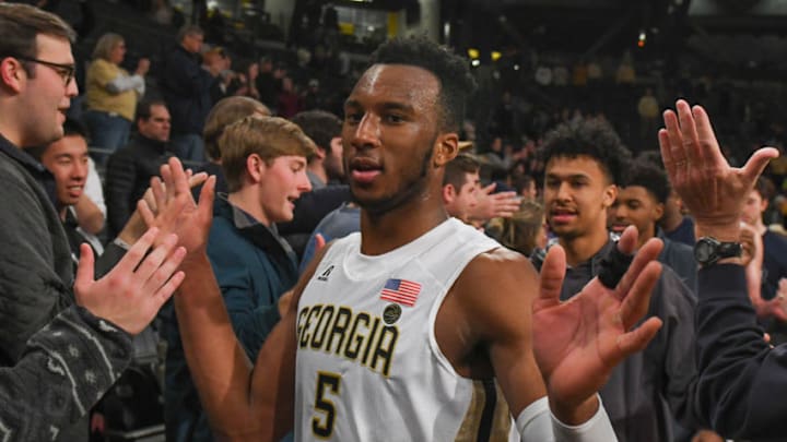 ATLANTA, GA JANUARY 3: Georgia Tech's Josh Okogie (5), who led all scorers with 30 points, gets high-fives from the fans following the conclusion of the game between Miami and Georgia Tech on January 3, 2018 at Hank McCamish Pavilion in Atlanta, GA. The Georgia Tech Yellow Jackets defeated the Miami Hurricanes by a score of 64 54. (Photo by Rich von Biberstein/Icon Sportswire via Getty Images)