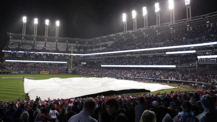 Nov 2, 2016; Cleveland, OH, USA; General view of the tarp over the field in the 10th inning of game seven of the 2016 World Series between the Chicago Cubs and the Cleveland Indians at Progressive Field. Mandatory Credit: Charles LeClaire-USA TODAY Sports