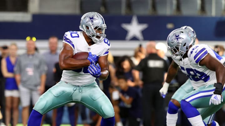 ARLINGTON, TX - AUGUST 26: Rico Gathers #80 of the Dallas Cowboys warms up before the preseason game against the Arizona Cardinals at AT&T Stadium on August 26, 2018 in Arlington, Texas. (Photo by Richard Rodriguez/Getty Images)