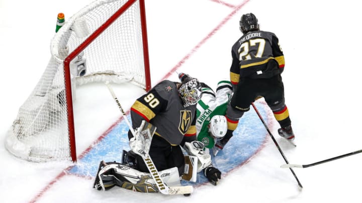 Robin Lehner #90 of the Vegas Golden Knights covers up the puck against Corey Perry #10 of the Dallas Stars during the third period in Game Five of the Western Conference Final. (Photo by Bruce Bennett/Getty Images)