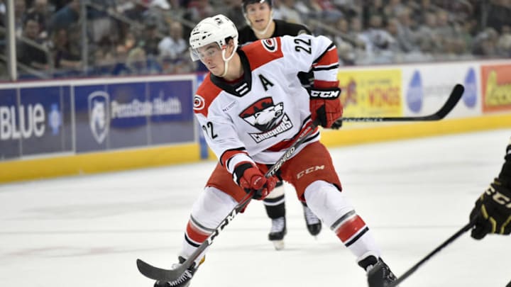 HERSHEY, PA - FEBRUARY 09: Charlotte Checkers center Andrew Poturalski (22) stickhandles a rolling puck during the Charlotte Checkers vs. Hershey Bears AHL game February 9, 2019 at the Giant Center in Hershey, PA. (Photo by Randy Litzinger/Icon Sportswire via Getty Images)