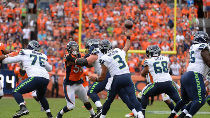 DENVER, CO - SEPTEMBER 9: Quarterback Russell Wilson #3 of the Seattle Seahawks throws a pass against the Seattle Seahawks at Broncos Stadium at Mile High on September 9, 2018 in {Denver, Colorado. (Photo by Bart Young/Getty Images)