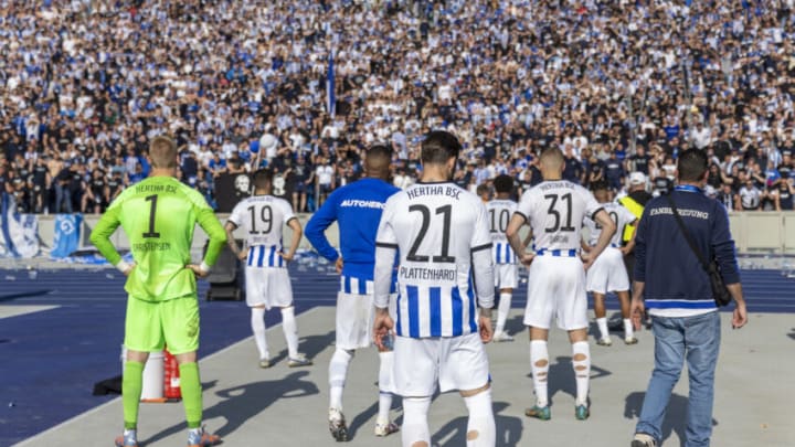 Hertha Berlin players applaud the fans after they were relegated from the Bundesliga. (Photo by Maja Hitij/Getty Images)