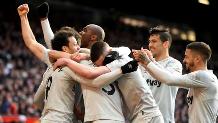 MANCHESTER, ENGLAND - APRIL 13: Felipe Anderson of West Ham United celebrates after scoring his team's first goal with his team mates during the Premier League match between Manchester United and West Ham United at Old Trafford on April 13, 2019 in Manchester, United Kingdom. (Photo by Gareth Copley/Getty Images)