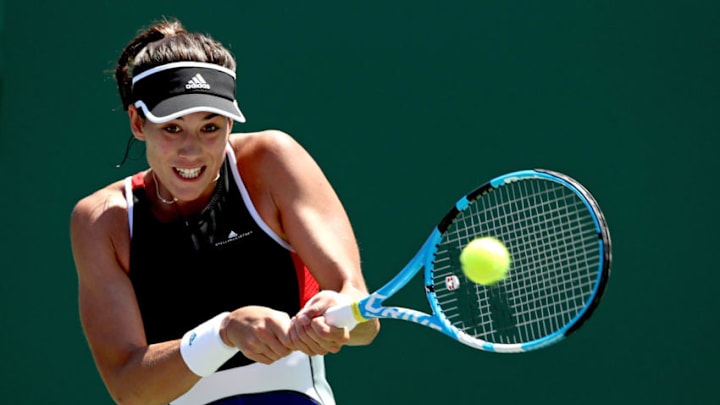 KEY BISCAYNE, FL - MARCH 26: Garbine Muguruza of Spain returns a shot to Sloane Stephens during the Miami Open Presented by Itau at Crandon Park Tennis Center on March 26, 2018 in Key Biscayne, Florida. (Photo by Matthew Stockman/Getty Images)