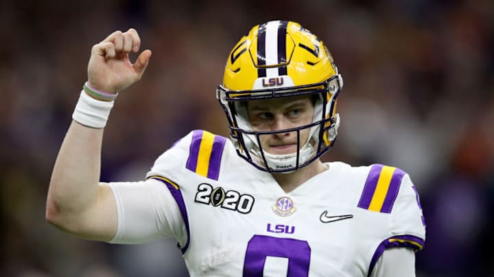 NEW ORLEANS, LOUISIANA - JANUARY 13: Joe Burrow #9 of the LSU Tigers reacts to a touchdown against Clemson Tigers during the third quarter in the College Football Playoff National Championship game at Mercedes Benz Superdome on January 13, 2020 in New Orleans, Louisiana. (Photo by Chris Graythen/Getty Images)