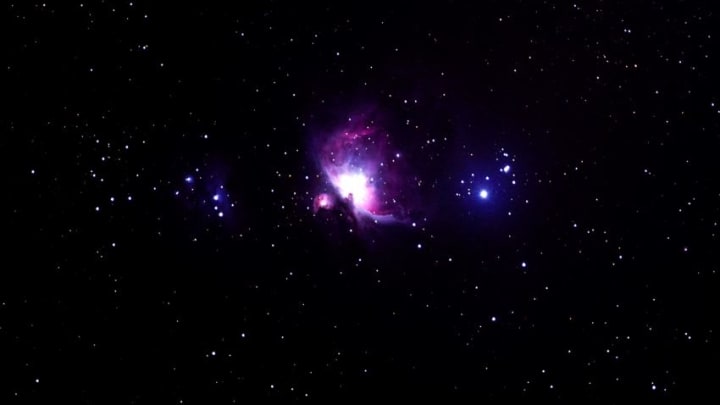 This long exposure picture taken late on November 22, 2017 shows the Orion Nebula (C), a diffuse nebula situated in the Milky Way, seen from Wundwin, near the Myanmar city of Mandalay. / AFP PHOTO / YE AUNG THU (Photo credit should read YE AUNG THU/AFP/Getty Images)