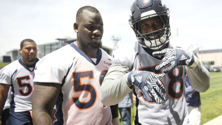 ENGLEWOOD, CO - MAY 22: Denver Broncos linebacker Von Miller (58) (right) coming off the field with linebacker Stansly Maponga (59) and followed by linebacker Bradley Chubb (55) after the morning session of the first day of Broncos OTA's at the UCHealth Training Center in Englewood. May 22, 2018 Englewood, Colorado. (Photo by Joe Amon/The Denver Post via Getty Images)