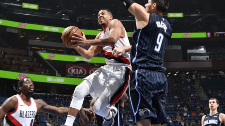 ORLANDO, FL - DECEMBER 15: CJ McCollum #3 of the Portland Trail Blazers handles the ball against the Orlando Magic on December 15, 2017 at Amway Center in Orlando, Florida. NOTE TO USER: User expressly acknowledges and agrees that, by downloading and or using this photograph, User is consenting to the terms and conditions of the Getty Images License Agreement. Mandatory Copyright Notice: Copyright 2017 NBAE (Photo by Fernando Medina/NBAE via Getty Images)