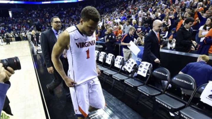 Mar 22, 2015; Charlotte, NC, USA; Virginia Cavaliers guard Justin Anderson (1) walks off the court after the game against the Michigan State Spartans in the third round of the 2015 NCAA Tournament at Time Warner Cable Arena. Michigan State won 60-54. Mandatory Credit: Bob Donnan-USA TODAY Sports