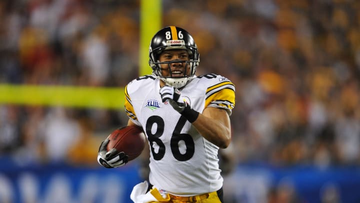 Feb 1, 2009; Tampa, FL, USA; Pittsburgh Steelers wide receiver Hines Ward (86) carries the ball after a catch in the first quarter of Super Bowl XLIII against the Arizona Cardinals at Raymond James Stadium. Mandatory Credit: Matt Cashore-USA TODAY Sports