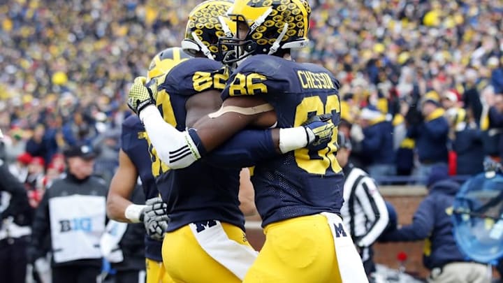 Nov 28, 2015; Ann Arbor, MI, USA; Michigan Wolverines wide receiver Amara Darboh (82) receives congratulations from wide receiver Jehu Chesson (86) in the third quarter at Michigan Stadium. Mandatory Credit: Rick Osentoski-USA TODAY Sports