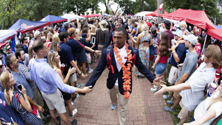OXFORD, MS - SEPTEMBER 8: C.J. Miller #8 of the Mississippi Rebels greets fans during the walk into the stadium before a game against the Southern Illinois Salukis at Vaught-Hemingway Stadium on September 8, 2018 in Oxford, Mississippi. (Photo by Wesley Hitt/Getty Images)